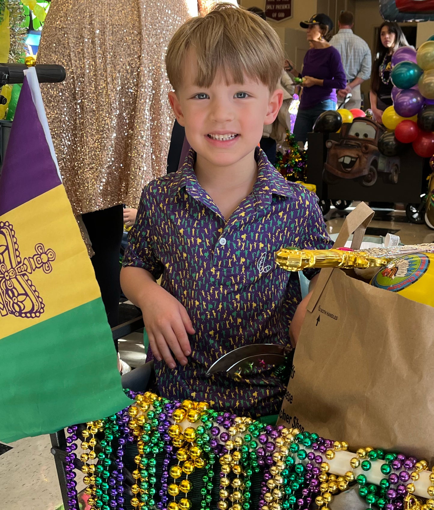 Introducing our Mardi Gras Carnival '25 Performance Polo, a pinnacle of style and functionality. Immerse yourself in the Second Line theme featuring unique design elements inspired by the rich culture and energy of the city, you'll stand out at school or on the parade route.