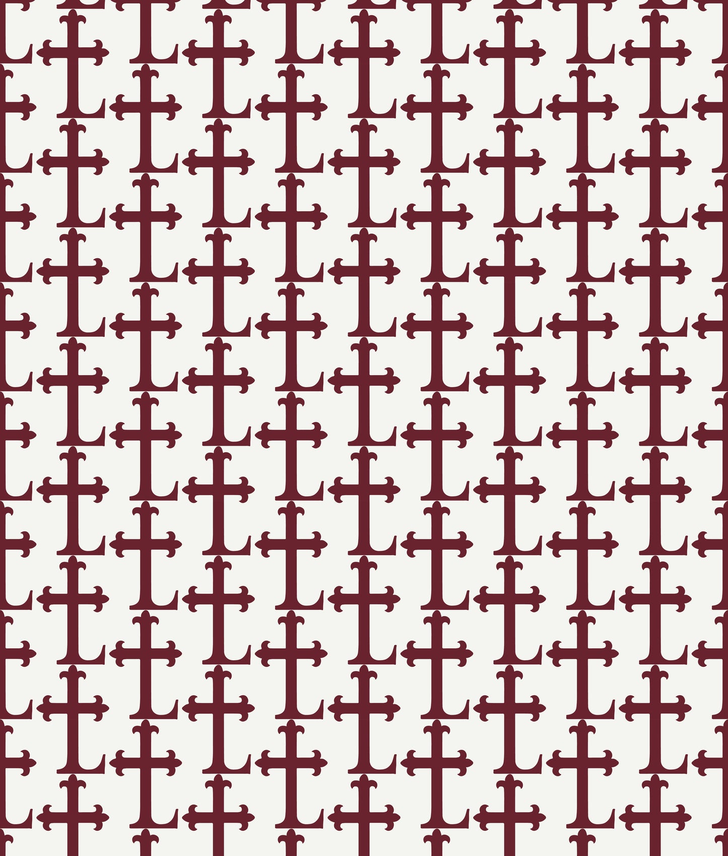 Crimson colored Lasallian cross patterned polo over white fabric.