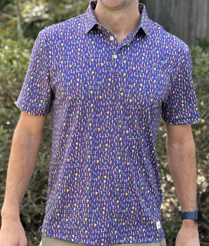 Introducing our Mardi Gras Carnival Performance Polo, a pinnacle of style and functionality. Immerse yourself in the Second Line theme featuring unique design elements inspired by the rich culture and energy of the city, you'll stand out in the office our on the parade route. 