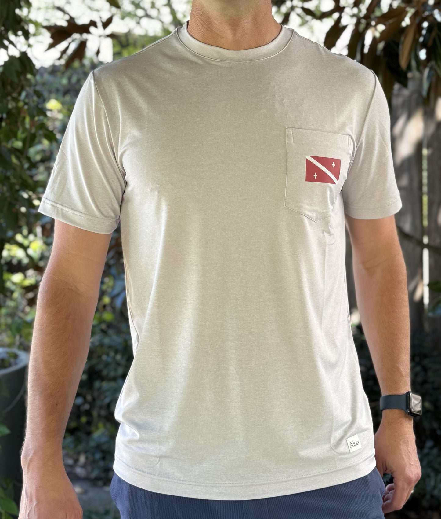 Alon Apparel's exclusive Dive Below Sea Level Pro Pocket tee features local bar graphics on a soft and comfortable performance fabric.