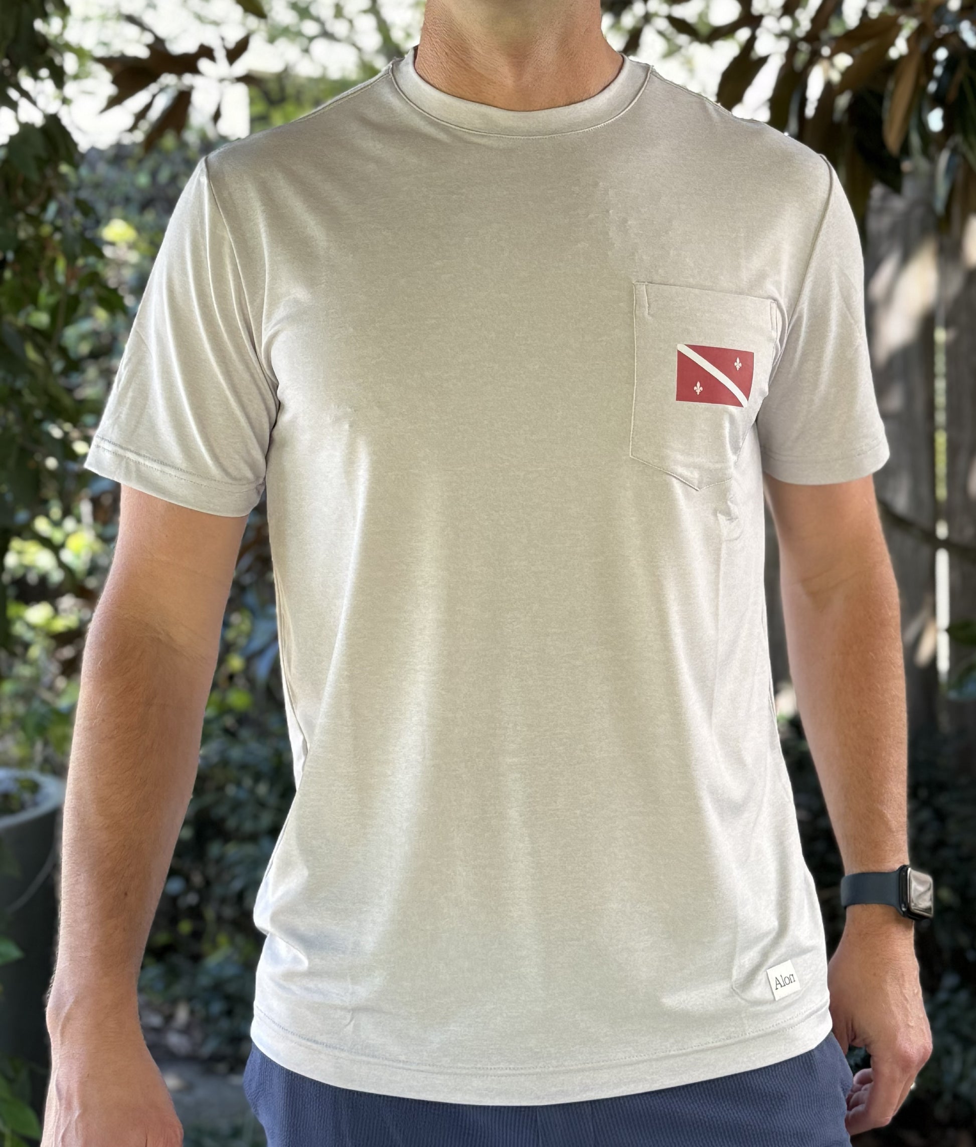 Alon Apparel's exclusive Dive Below Sea Level Pro Pocket tee features local bar graphics on a soft and comfortable performance fabric.