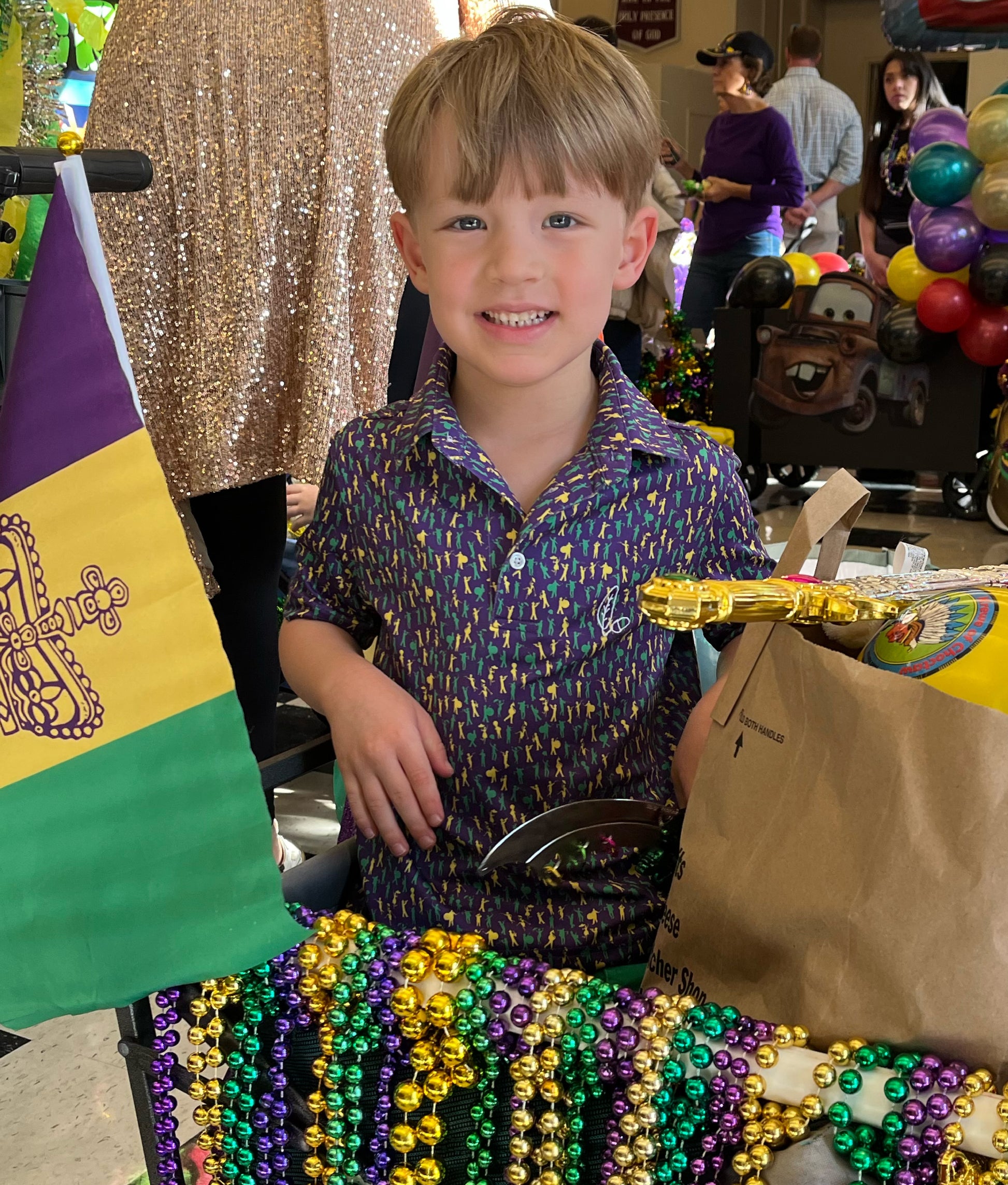 Introducing our Mardi Gras Carnival '25 Performance Polo, a pinnacle of style and functionality. Immerse yourself in the Second Line theme featuring unique design elements inspired by the rich culture and energy of the city, you'll stand out at school or on the parade route. 