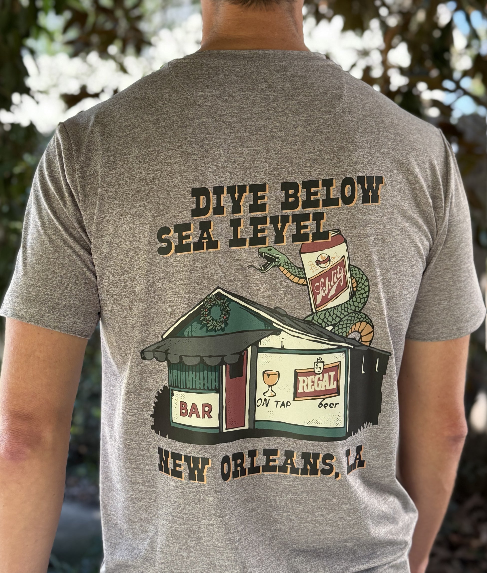 Alon Apparel's exclusive Dive Below Sea Level Pro Pocket tee features local bar graphics on a soft and comfortable performance fabric.