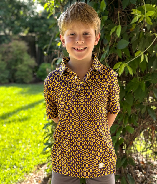 Introducing our Ole War Skule Performance Polo, a pinnacle of style and functionality designed to elevate your child's active lifestyle.